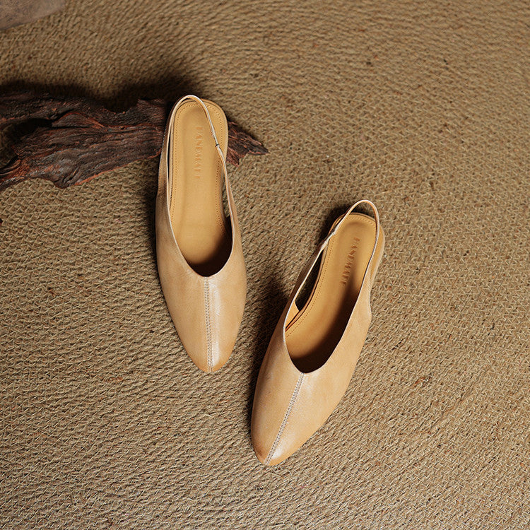 Beige leather pointed toe slingback flats with V-cut vamp, sleek silhouette for professional wear