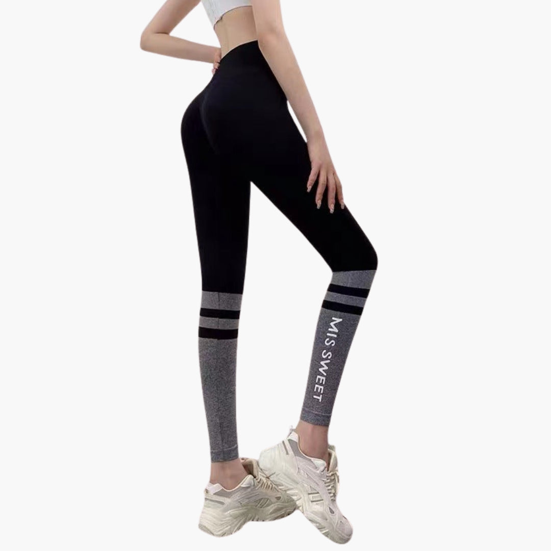 Women's high-waisted gradient sports leggings with contrasting stripes and tapered ankle pull-on design