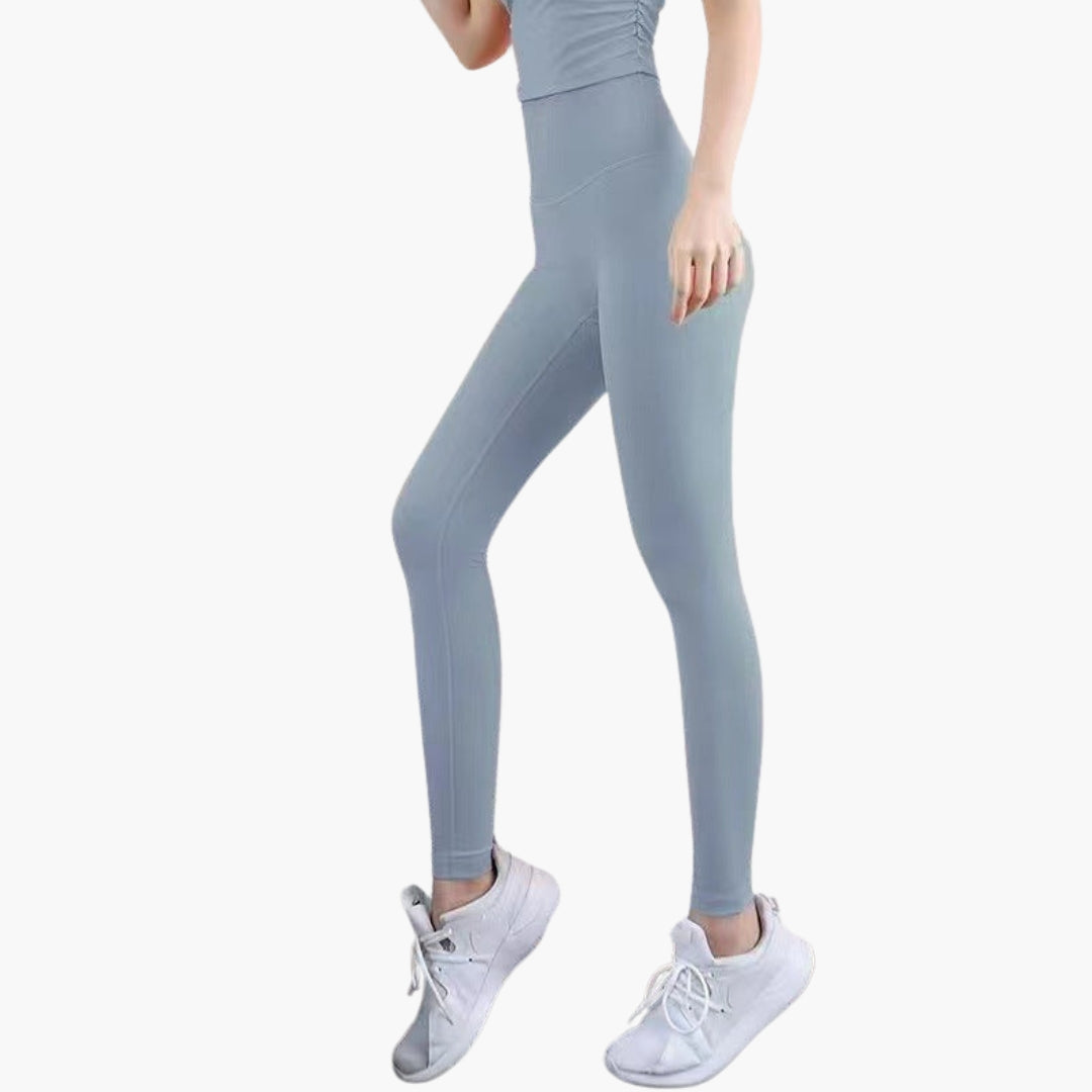 High-waisted women's gym leggings full-length stretch fabric sleek pocketless design active fit
