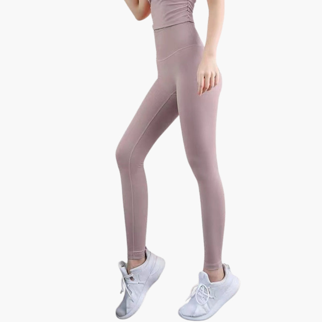 High-waisted women's gym leggings in full-length stretch fabric, sleek pocketless design for active fit