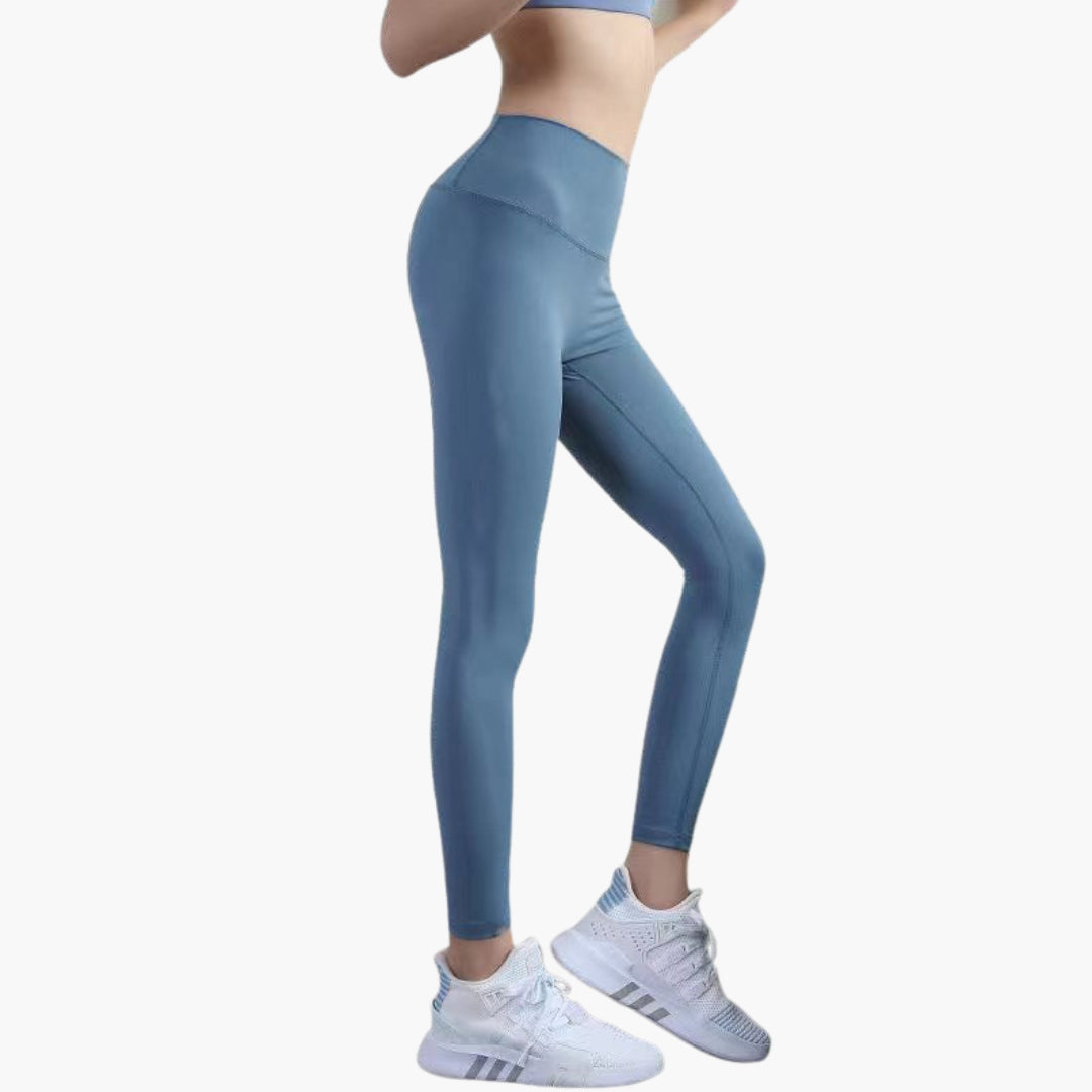 High-waisted women's sports leggings full-length stretch fabric sleek pocketless design gym-ready fit