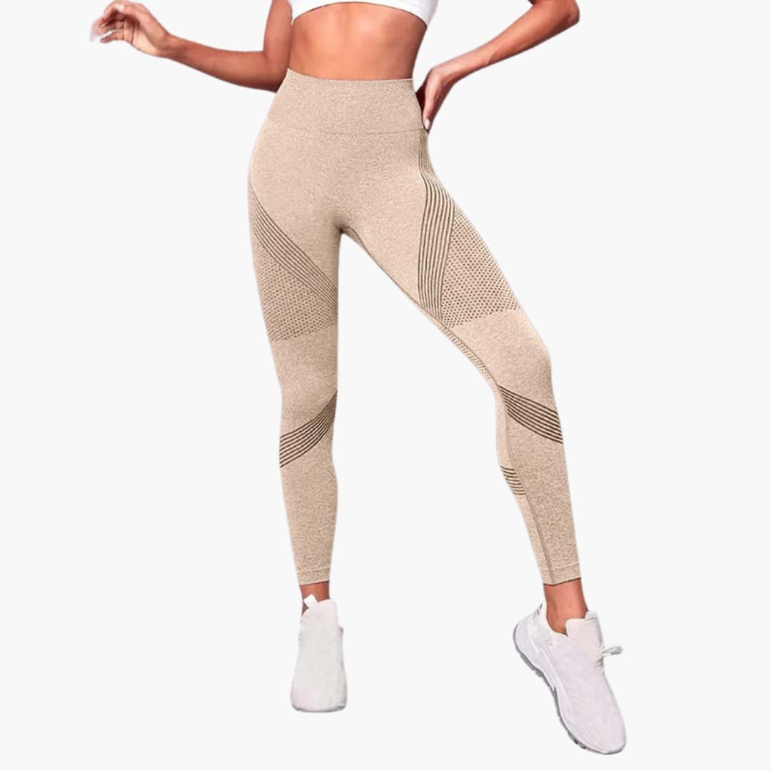 Women's black high-waist seamless gym leggings with breathable mesh panels for training