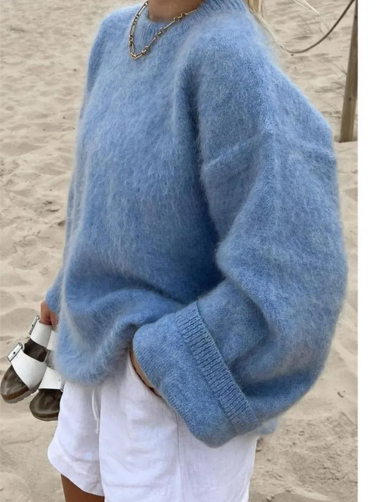 Women's oversized wool sweater soft fluffy knit relaxed silhouette ideal for cozy layering
