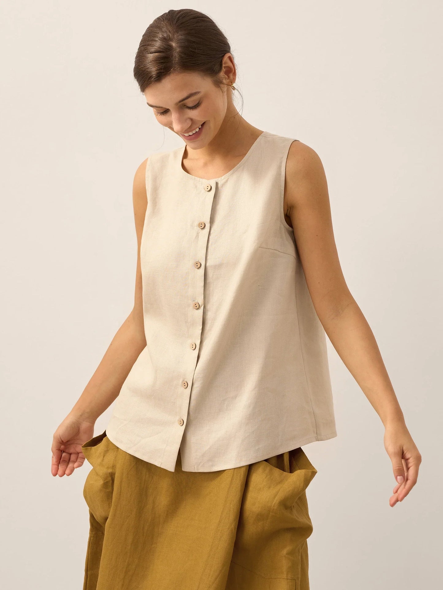 Women's loose-fit linen blouse lightweight breathable summer top neutral tones button closure