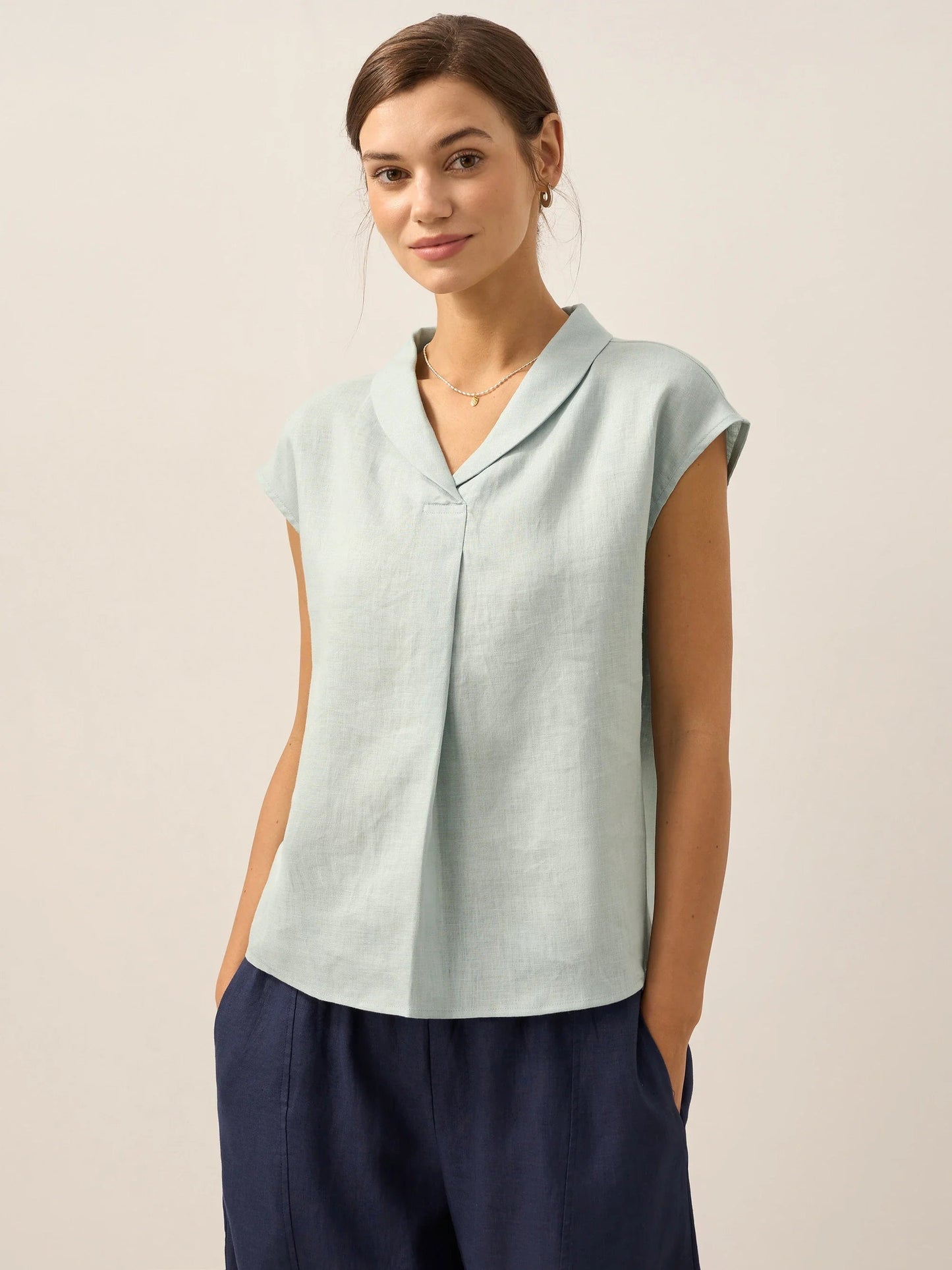 Women's lightweight linen V-neck top, relaxed fit cap sleeves, breathable warm-weather essential