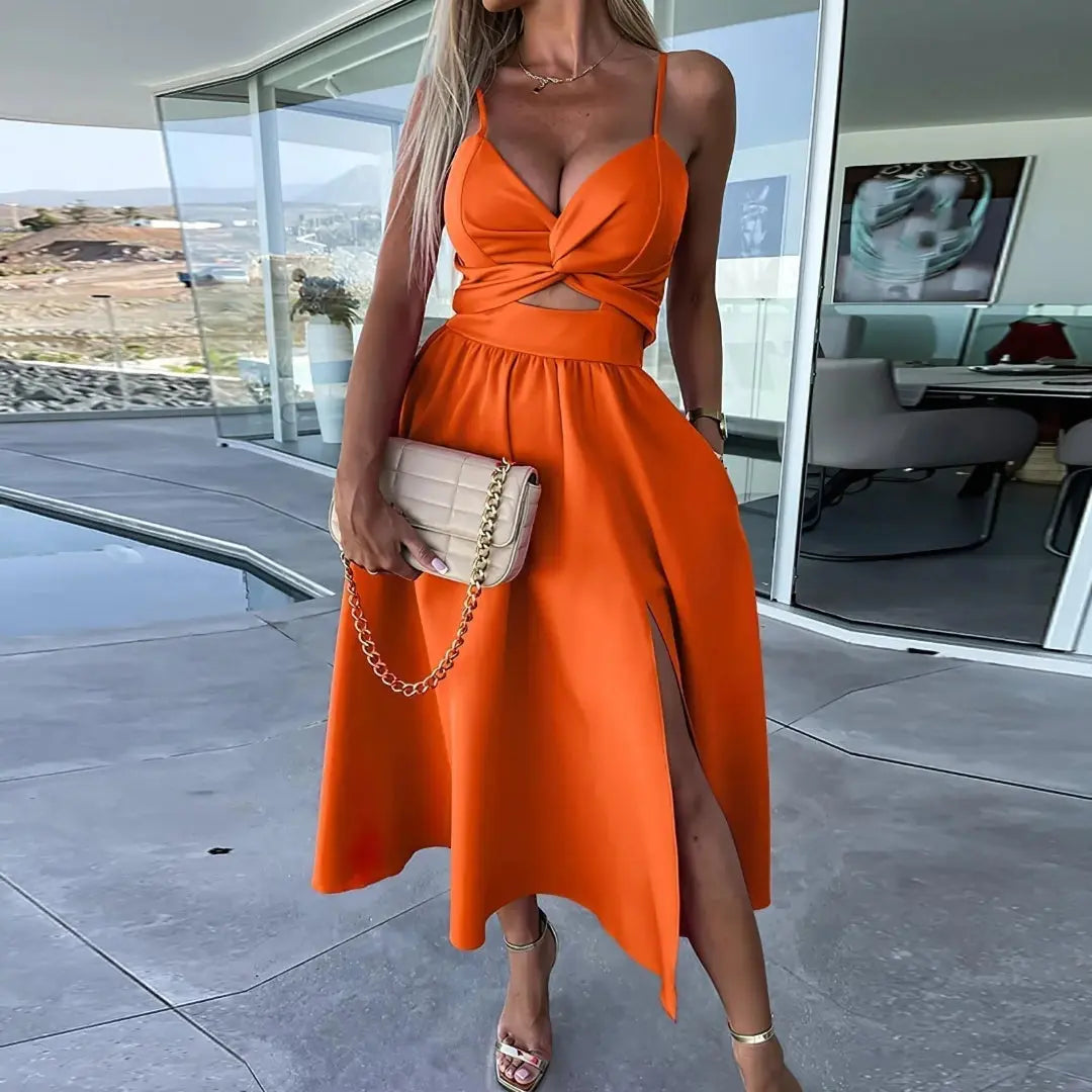 Chic black midi dress with twist front, spaghetti straps, cutout bodice, and side slit