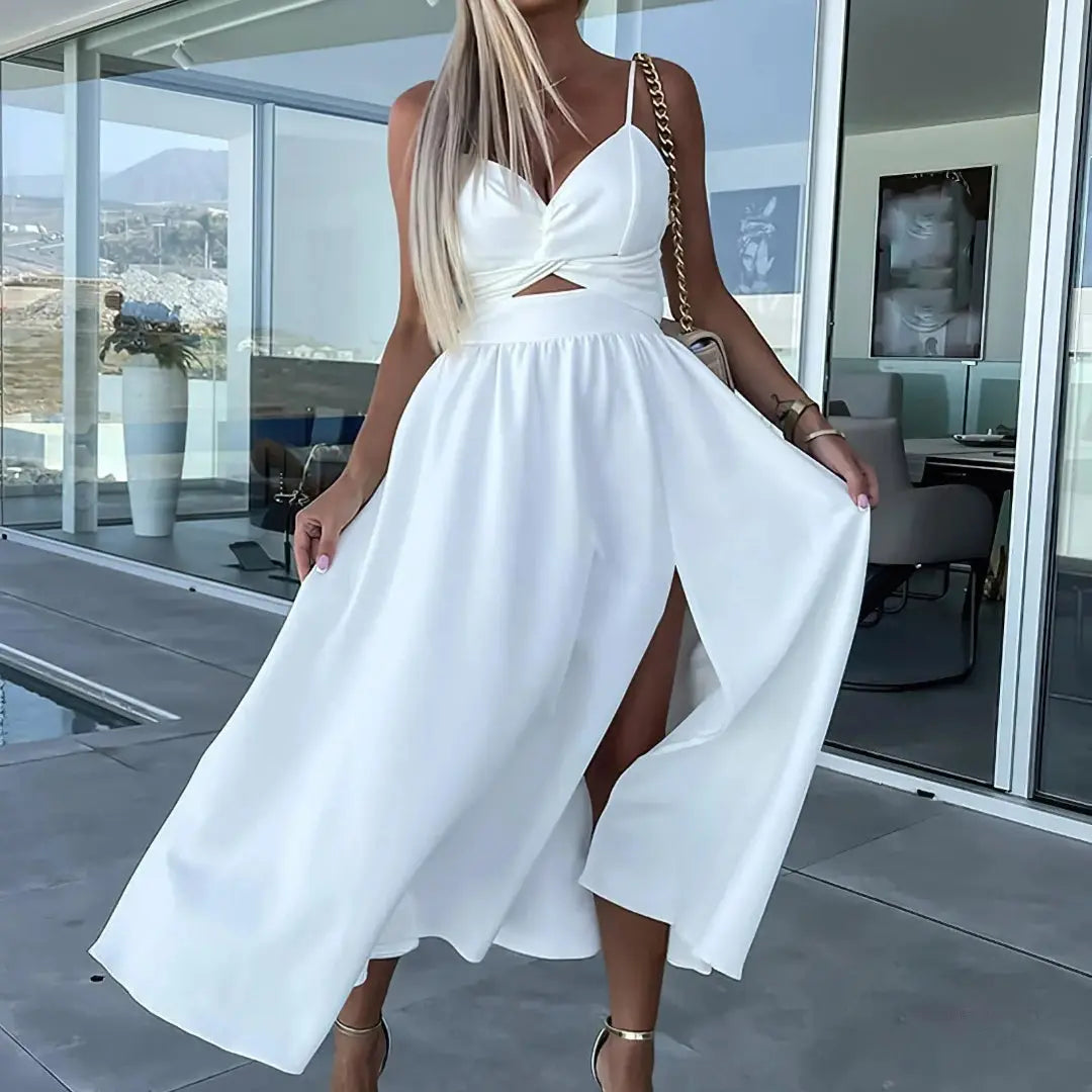 Chic midi dress with twist-front bodice, midriff cutout, spaghetti straps, and side slit