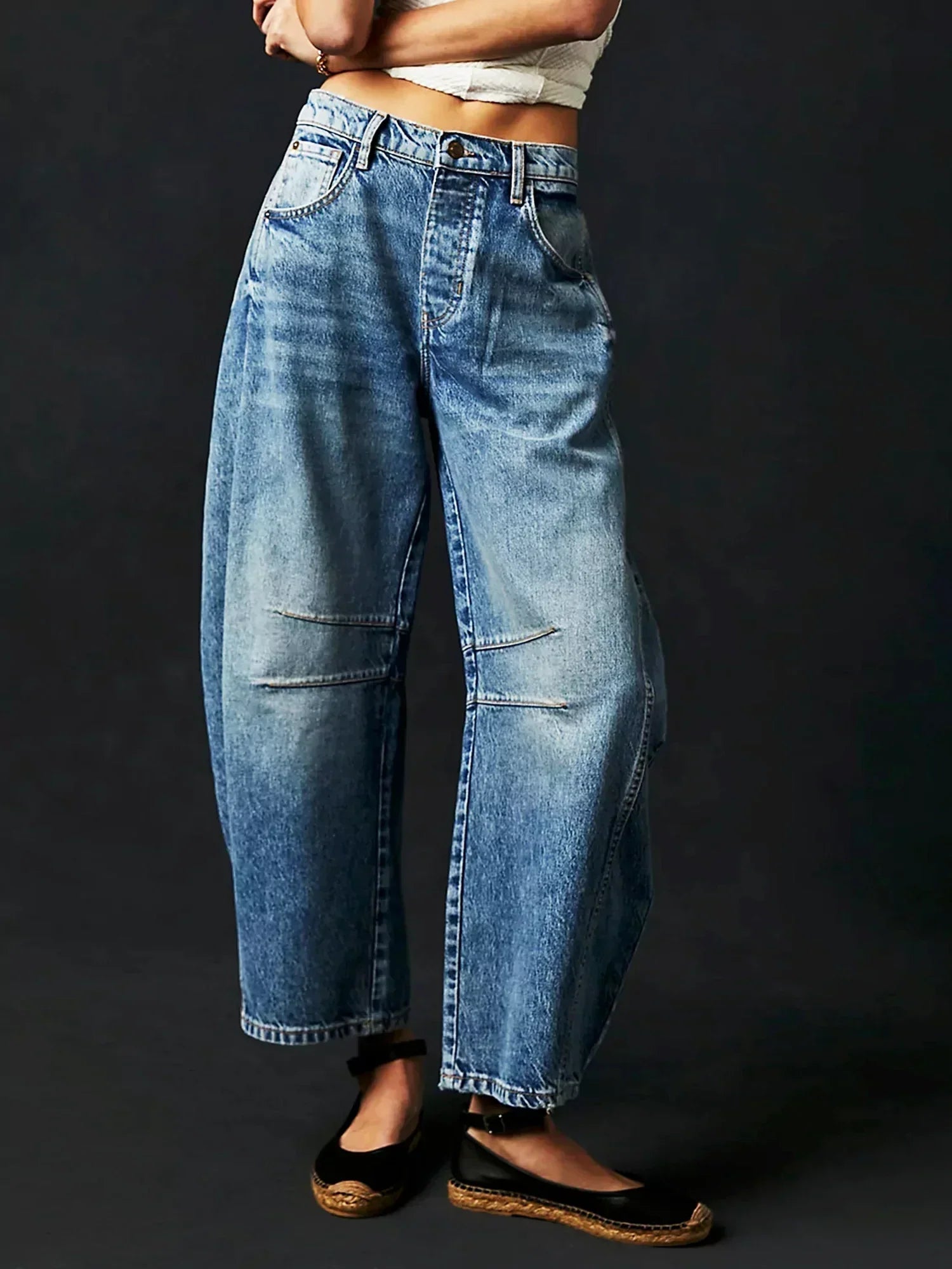 Women's leopard print barrel jeans wide-leg relaxed cut with all-over animal pattern bold denim style