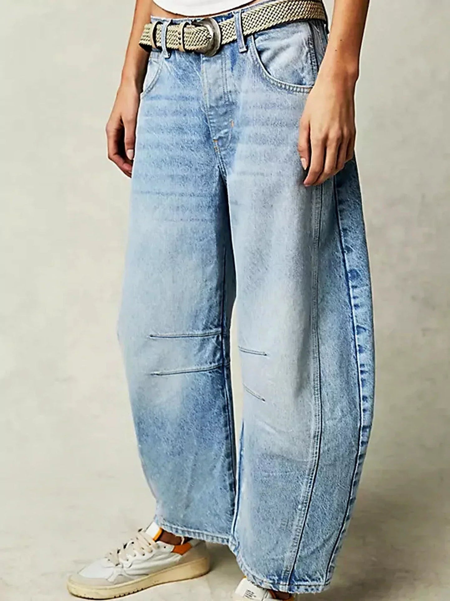 Women's leopard print barrel jeans wide-leg relaxed cut with all-over bold animal pattern