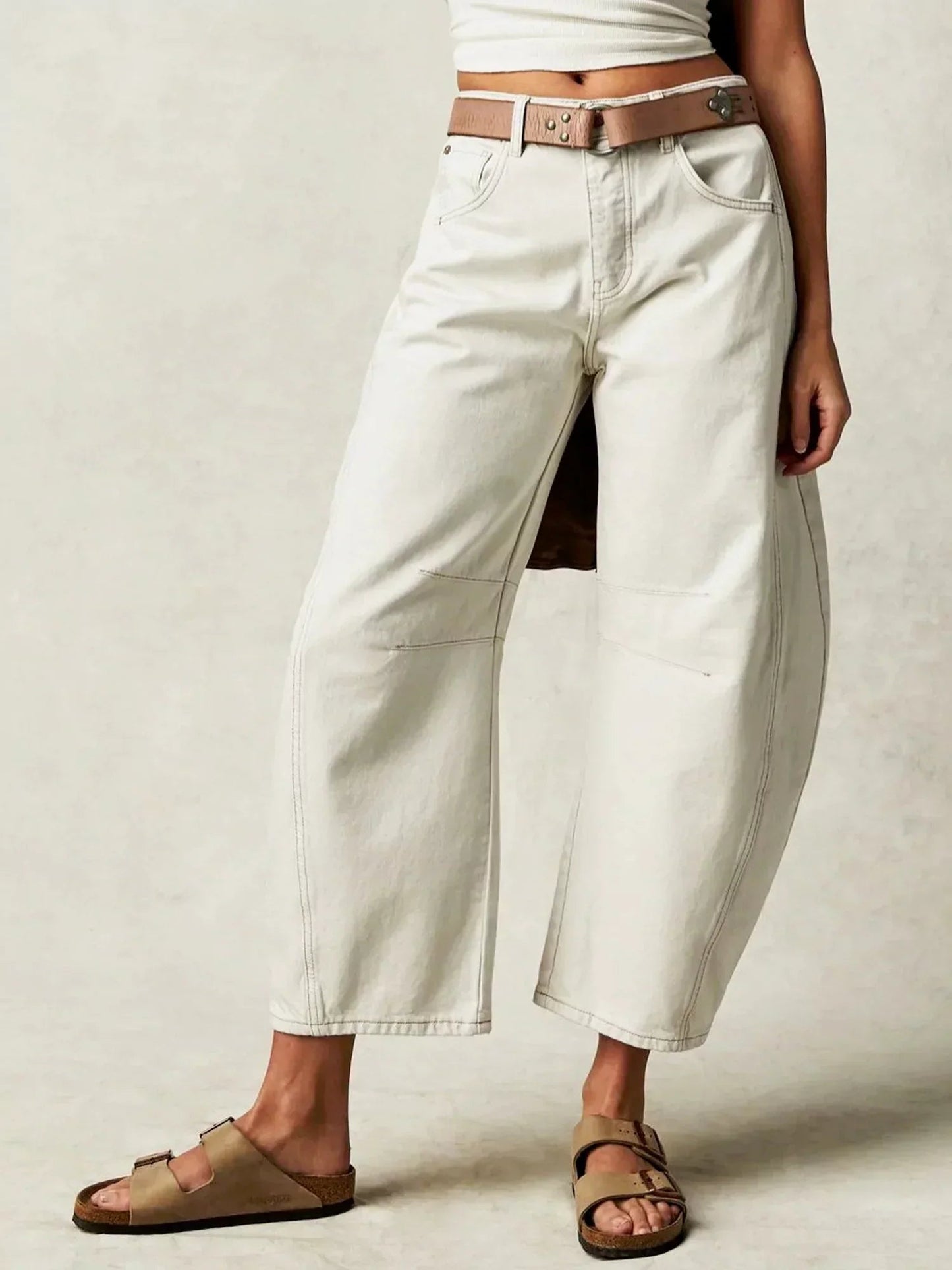 Women's leopard print barrel jeans wide-leg relaxed denim with all-over animal pattern bold edgy fit