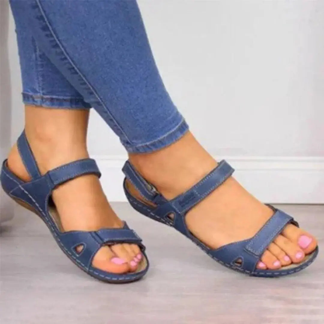 Women's beige open-toe wedge sandals with orthopedic footbed and adjustable straps for arch support