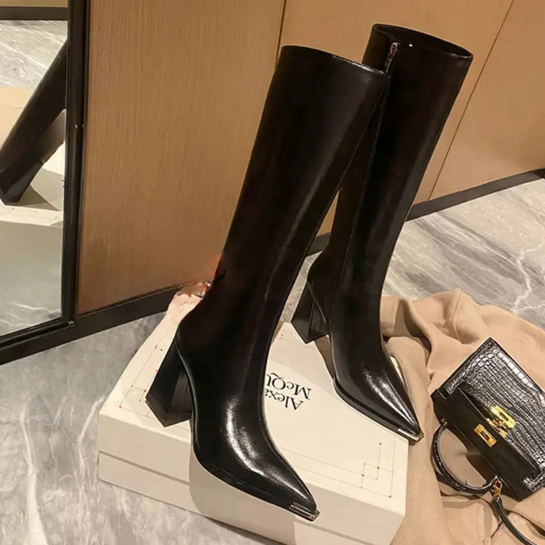 Women's glossy leather square heel boots with cushioned footbed, bold statement silhouette