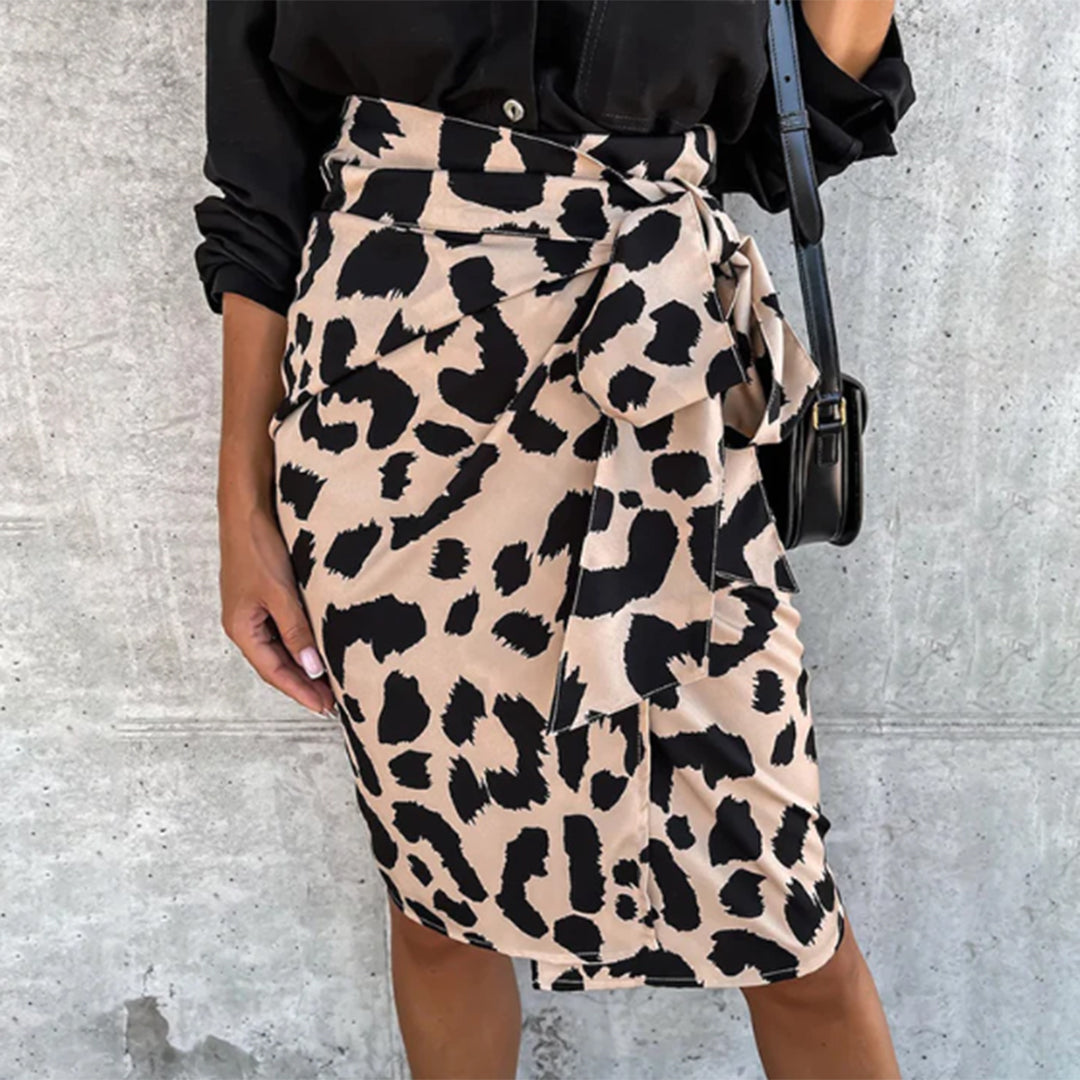 Women's animal print wrap skirt with adjustable waist tie, elegant flowing silhouette