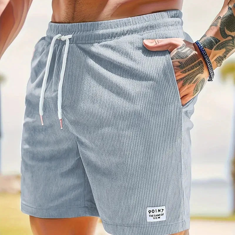 Men's beige corduroy drawstring shorts relaxed fit textured fabric casual beach everyday wear