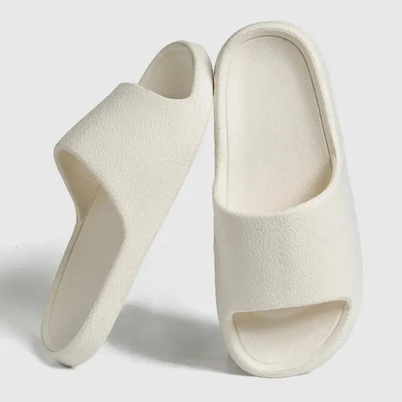 Women's lightweight EVA indoor slides with massage texture sole and non-slip design for home comfort