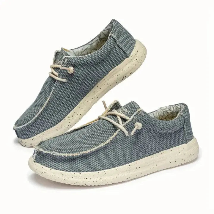 Women's lightweight slip-on shoes in neutral tones, cushioned sole, casual everyday comfort fit