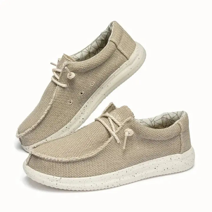 Women's lightweight slip-on shoes in neutral tones, casual everyday style with supportive rubber sole