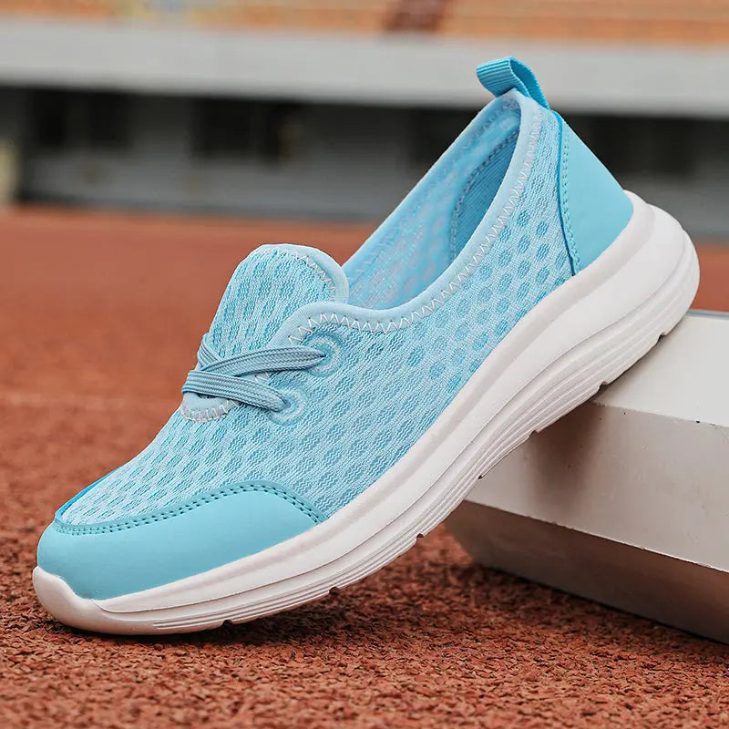 Women's lightweight slip-on walking shoes breathable knit upper low-profile silhouette travel-ready