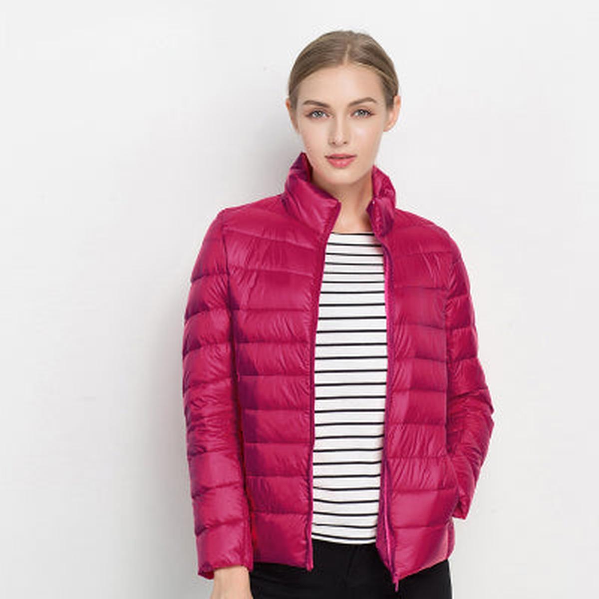 Women's black ultralight packable down jacket waterproof quilted silhouette for outdoor everyday wear