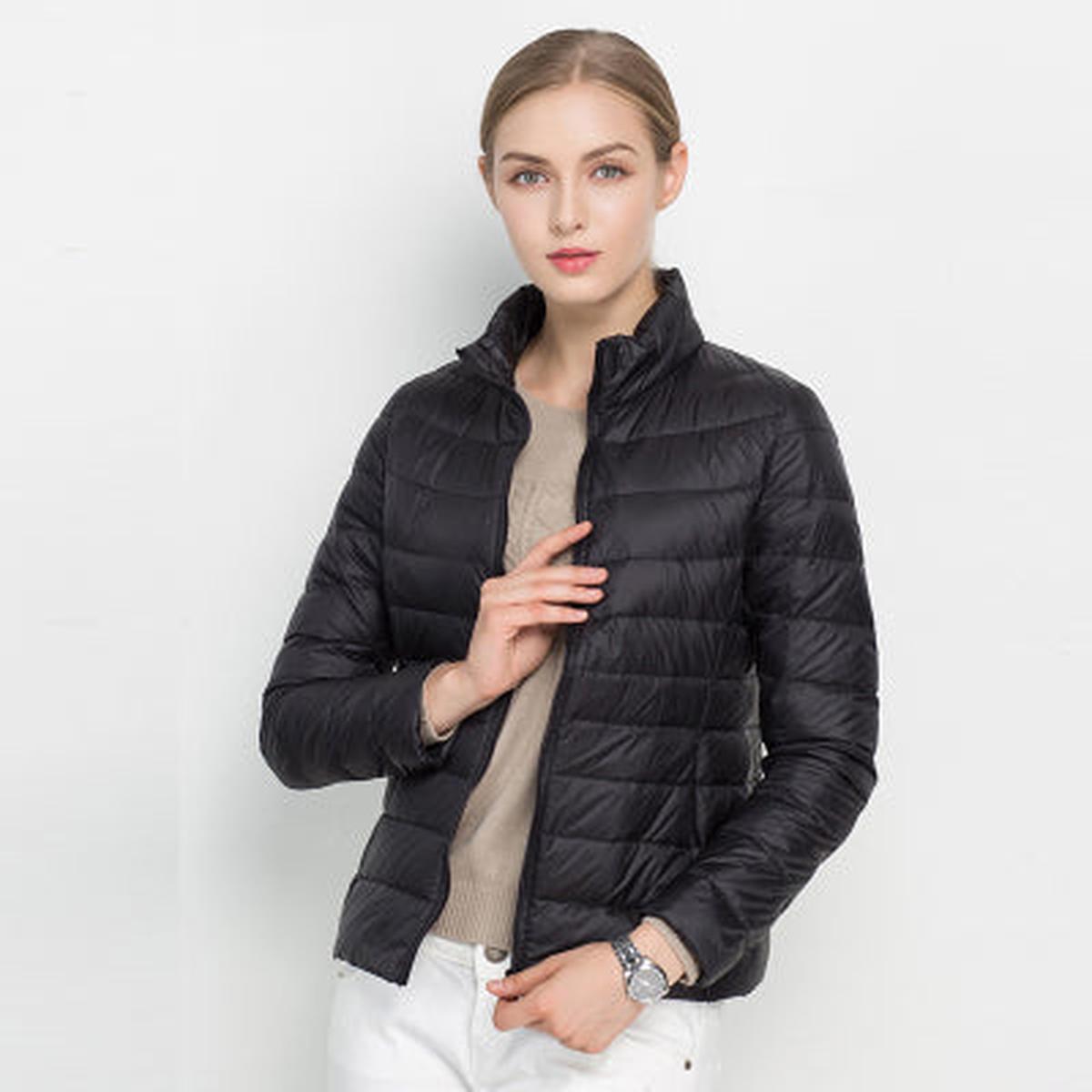 Women's navy blue quilted packable down jacket lightweight waterproof slim silhouette outdoor wear