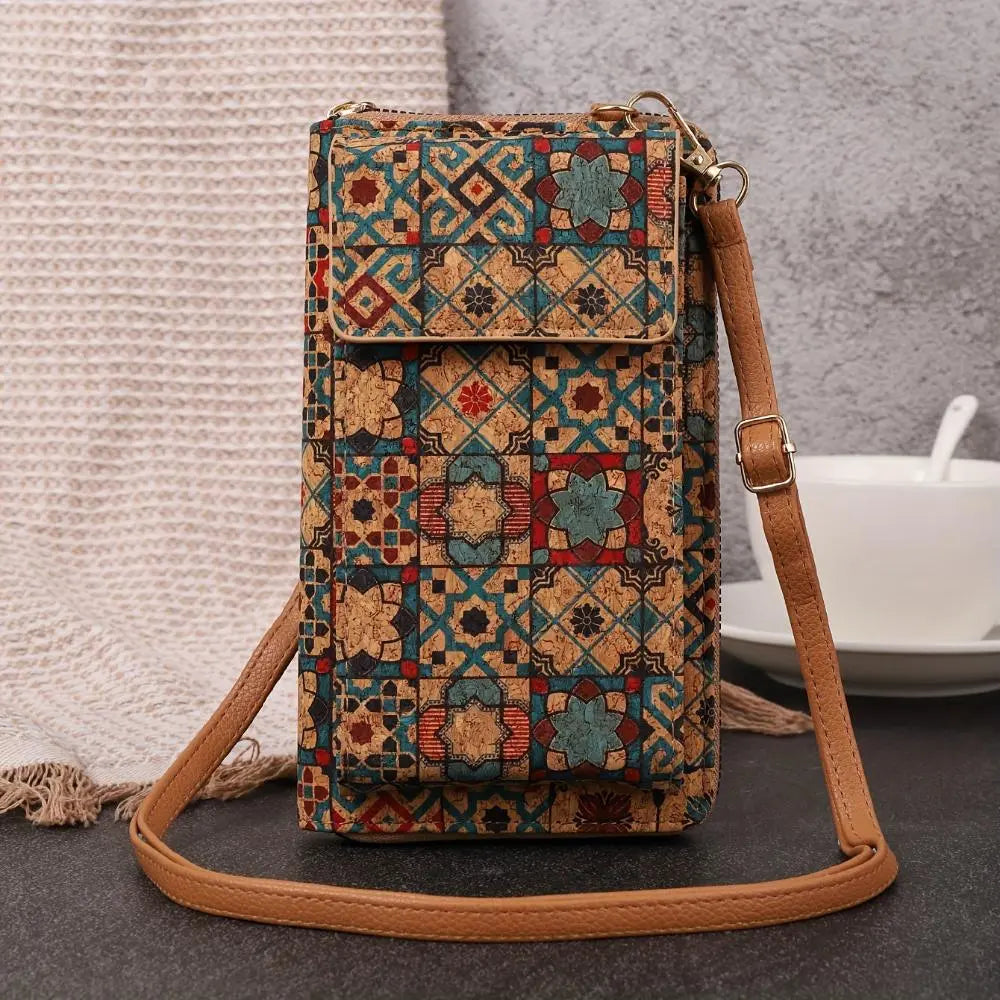 Paula floral cork crossbody phone pouch with vibrant print, flap closure, and adjustable strap