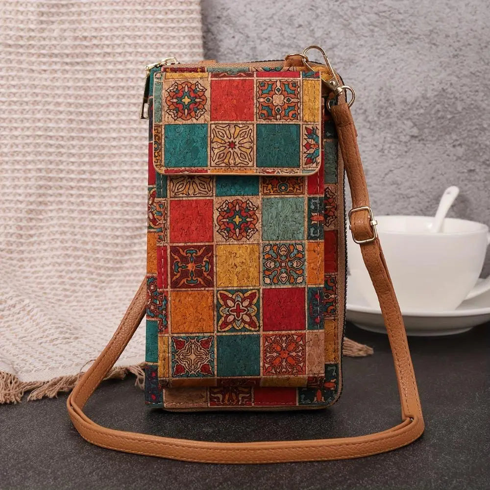 Paula floral cork crossbody phone pouch with vibrant print, flap closure, and adjustable strap
