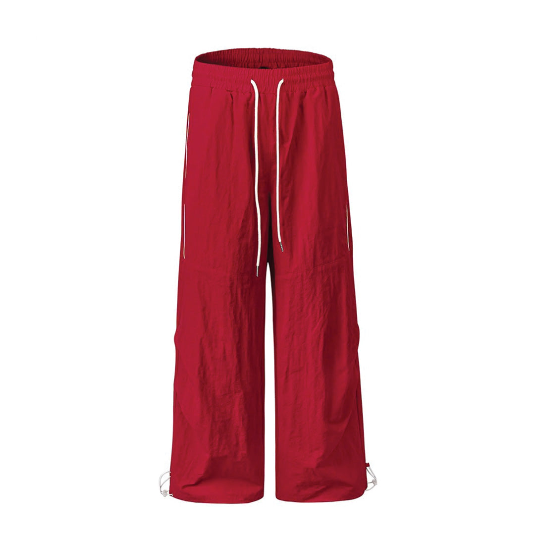 Black nylon pleated jogger pants wide leg fit elastic waist modern men casual style