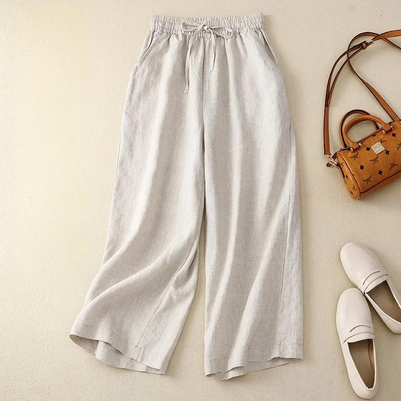 Women's beige wide-leg linen pants with adjustable drawstring waist, relaxed fit lightweight blend