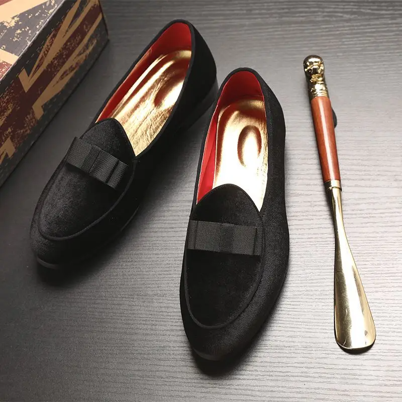 Navy velvet loafer with bold satin bow, almond toe, matte sheen, elegant slip-on for formal events