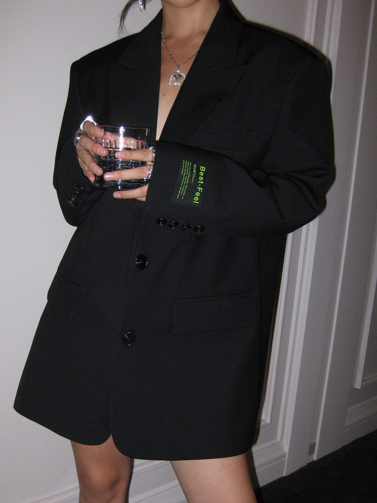 Women's oversized blazer coat with notched lapel, classic tailored silhouette for power dressing