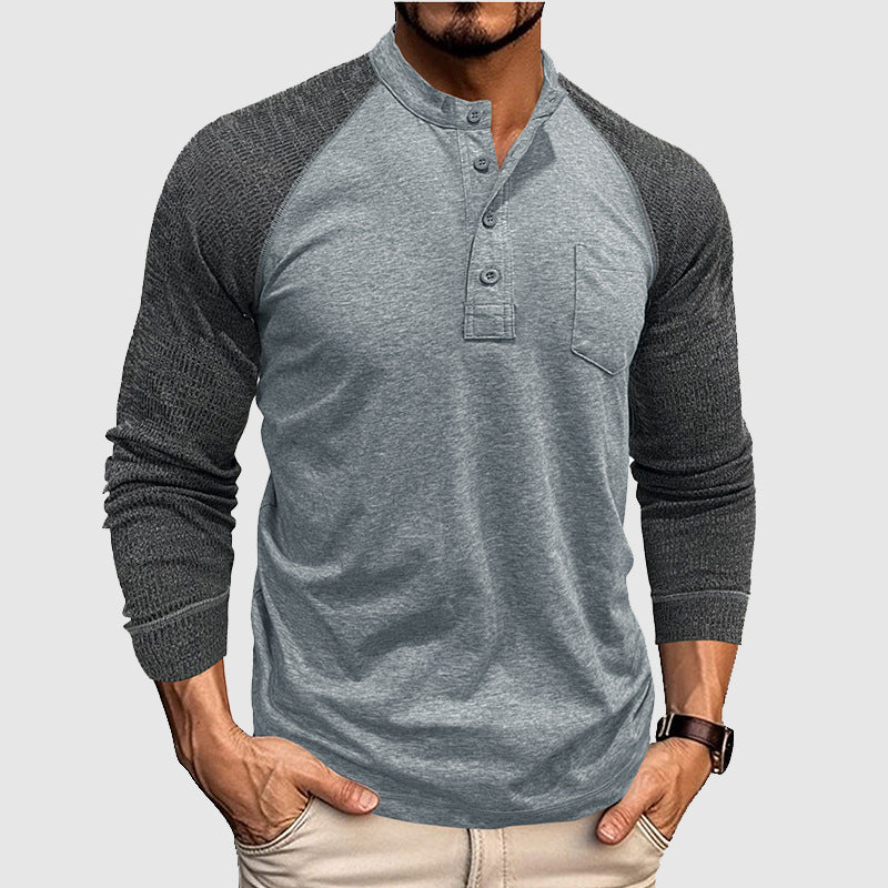 Men's dual-tone Henley shirt in color-block design with contrast stitching for casual sophistication