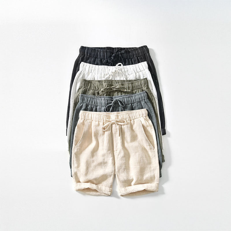 Men's beige linen blend shorts above-knee cut with elastic waistband drawstring structured silhouette