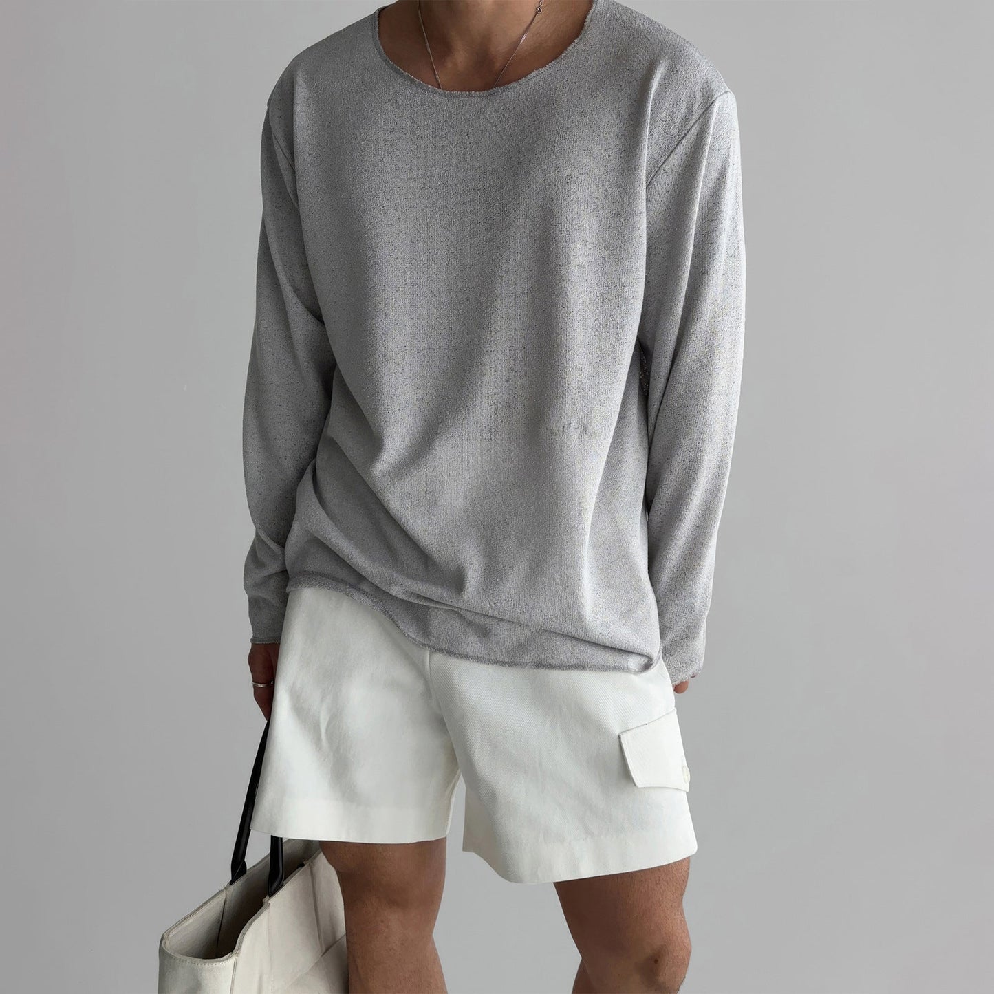 Men's breathable knit shirt in relaxed fit, premium polyester blend with smooth draped texture