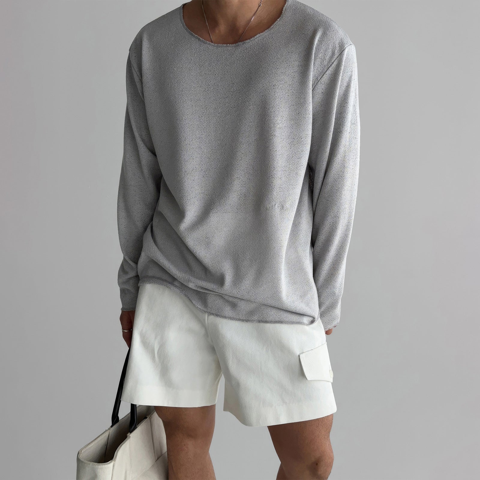 Men's breathable knit shirt in relaxed fit, premium polyester blend with smooth draped texture