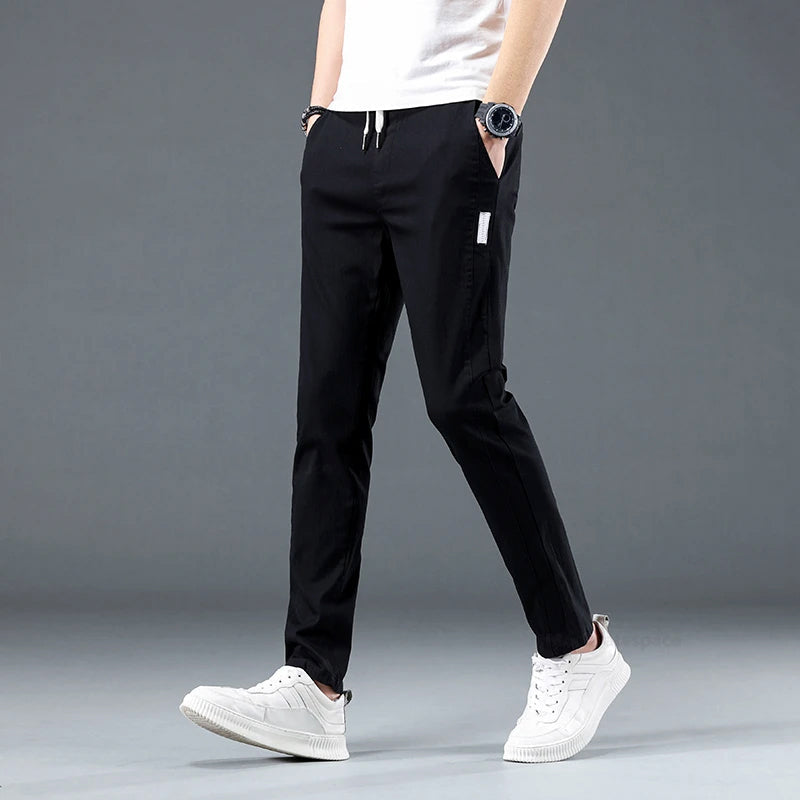 Men's slim fit stretch cotton pants with elastic waist, breathable smart-casual trousers with pockets