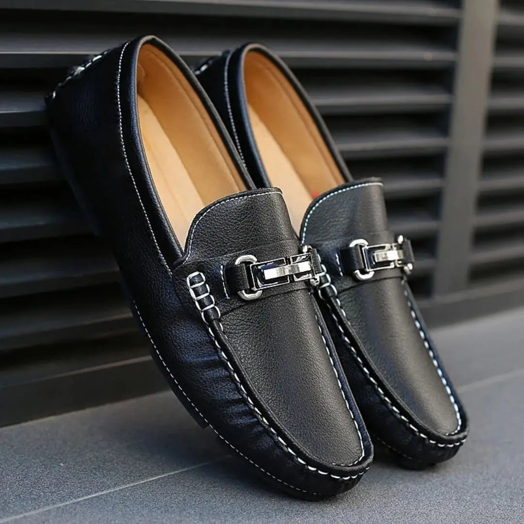 Men's brown genuine leather slip-on loafers with sleek metal buckle and cushioned insole classic dress style