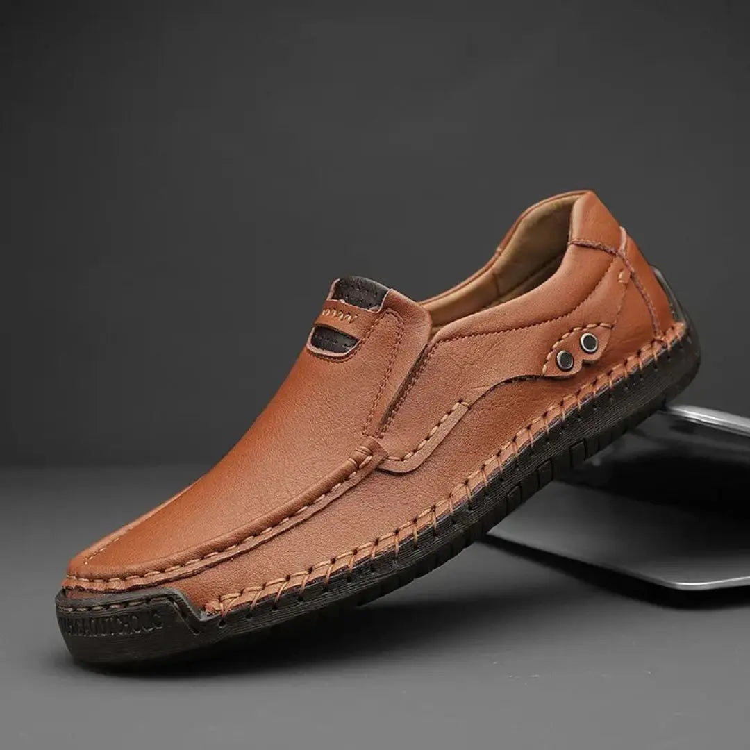 Men's brown genuine leather classic loafers with cushioned insole and hand-stitched detailing