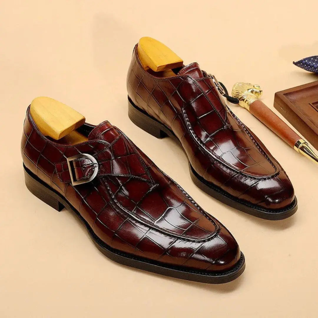 Black alligator-embossed monk strap dress shoes with genuine leather and double buckle closure
