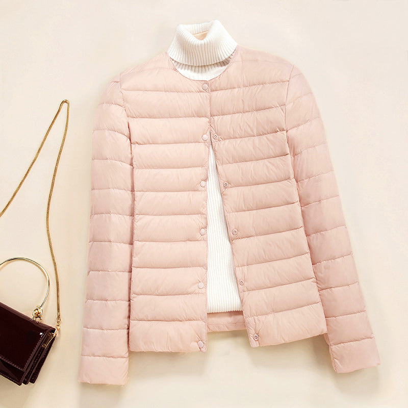 Women's lightweight quilted down jacket snap button closure refined warm layering everyday style