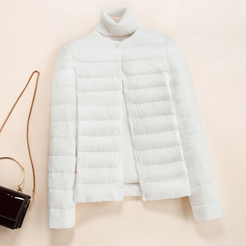 Women's lightweight quilted down jacket snap button closure refined warm layering style