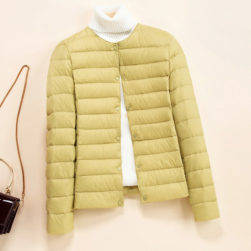 Women's lightweight quilted down jacket, snap button closure, slim silhouette, refined warmth
