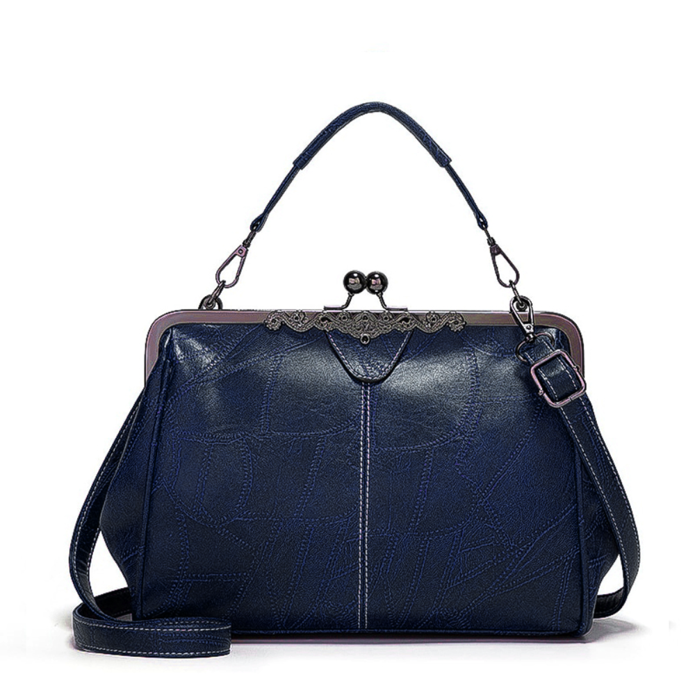 Jacqueline structured faux leather handbag in classic tones with vintage clasp closure and adjustable strap