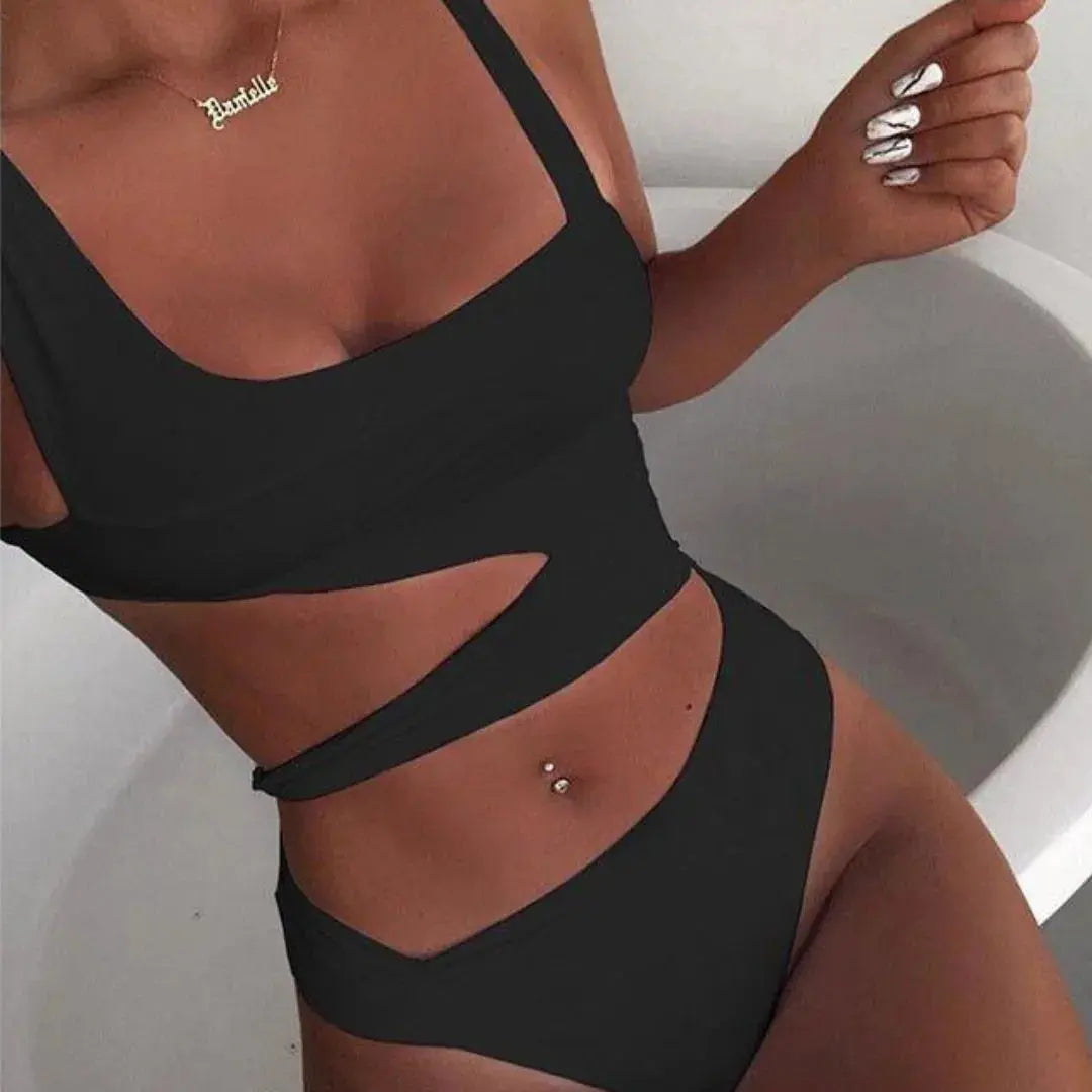 Luna black cut-out one-piece swimsuit high-waisted silhouette with bold side openings