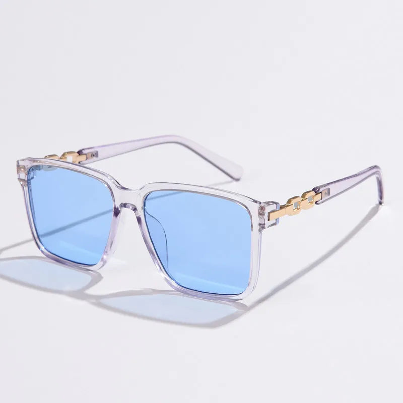 Square gradient lens sunglasses with gold chain accent arms, retro-glam style for women