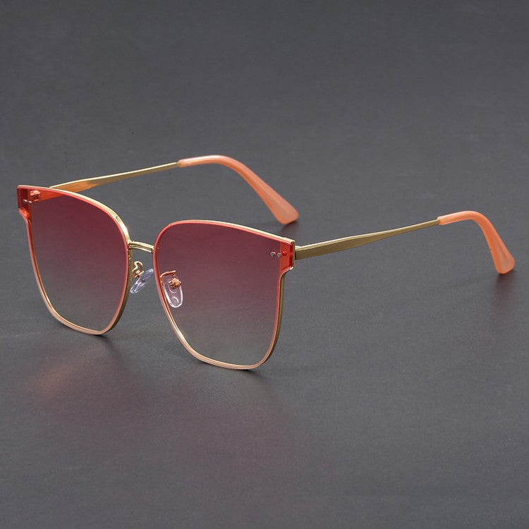 Lightweight cat-eye sunglasses gold-tone frame UV protection sleek modern silhouette for women