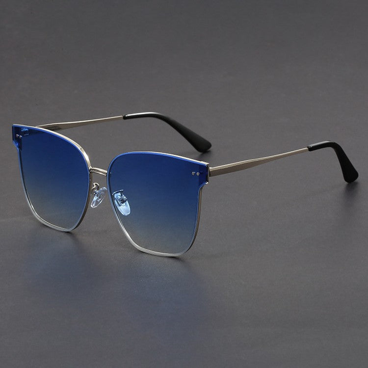 Lightweight cat-eye sunglasses with gold-tone frame and UV protection for modern women