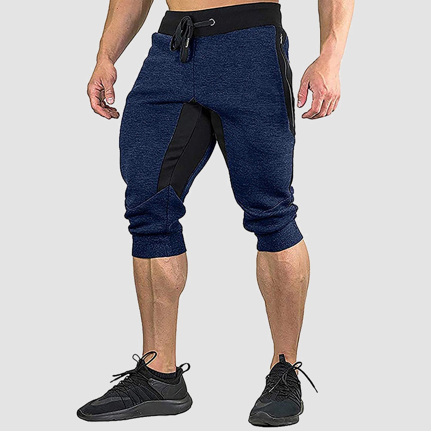 Men's gray cropped cotton stretch sweatpants with elastic waistband and multi-pocket gym shorts