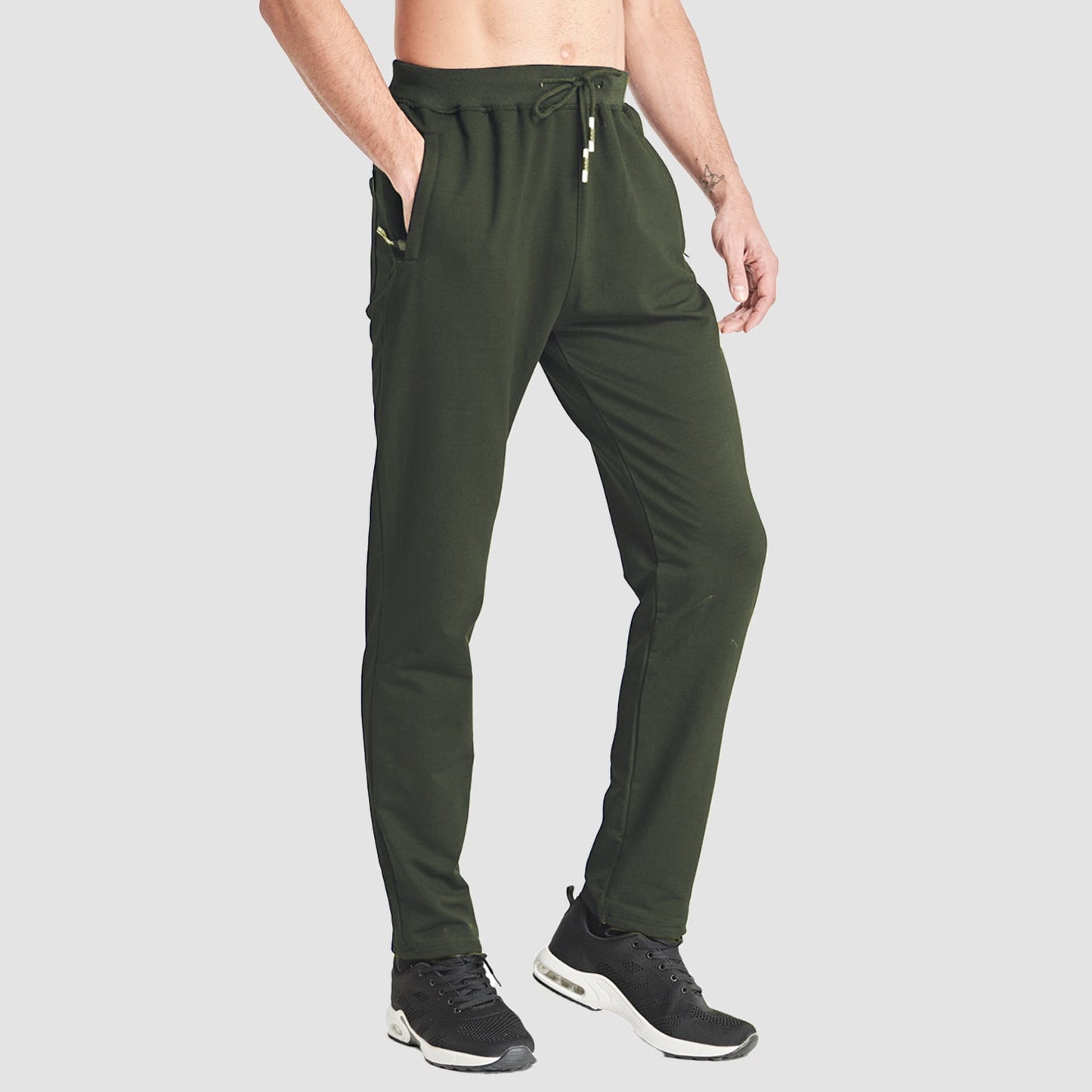 Men's gray slim-fit sweatpants with adjustable waist and zip pockets for gym training