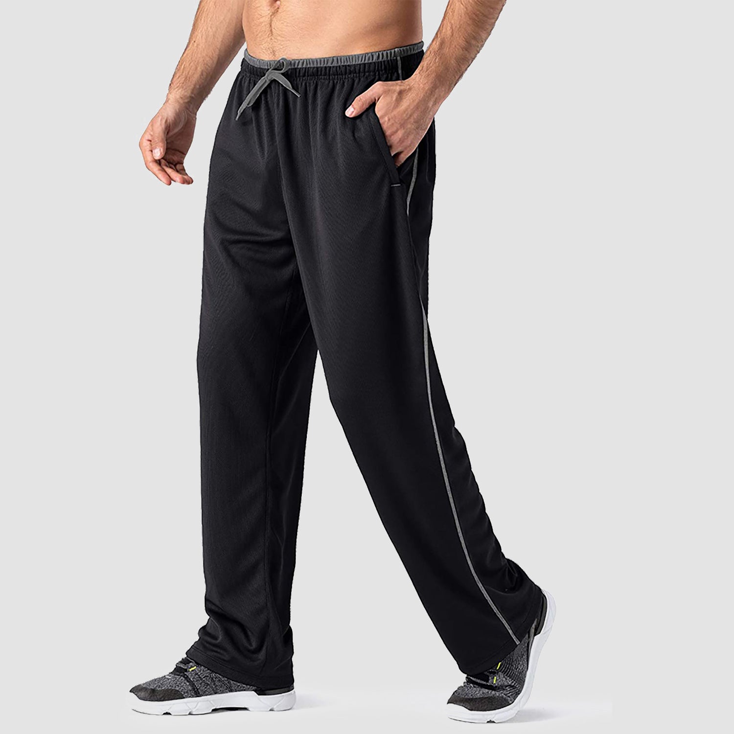 Men's loose-fit quick-dry sweatpants with moisture-wicking fabric and secure zip pockets