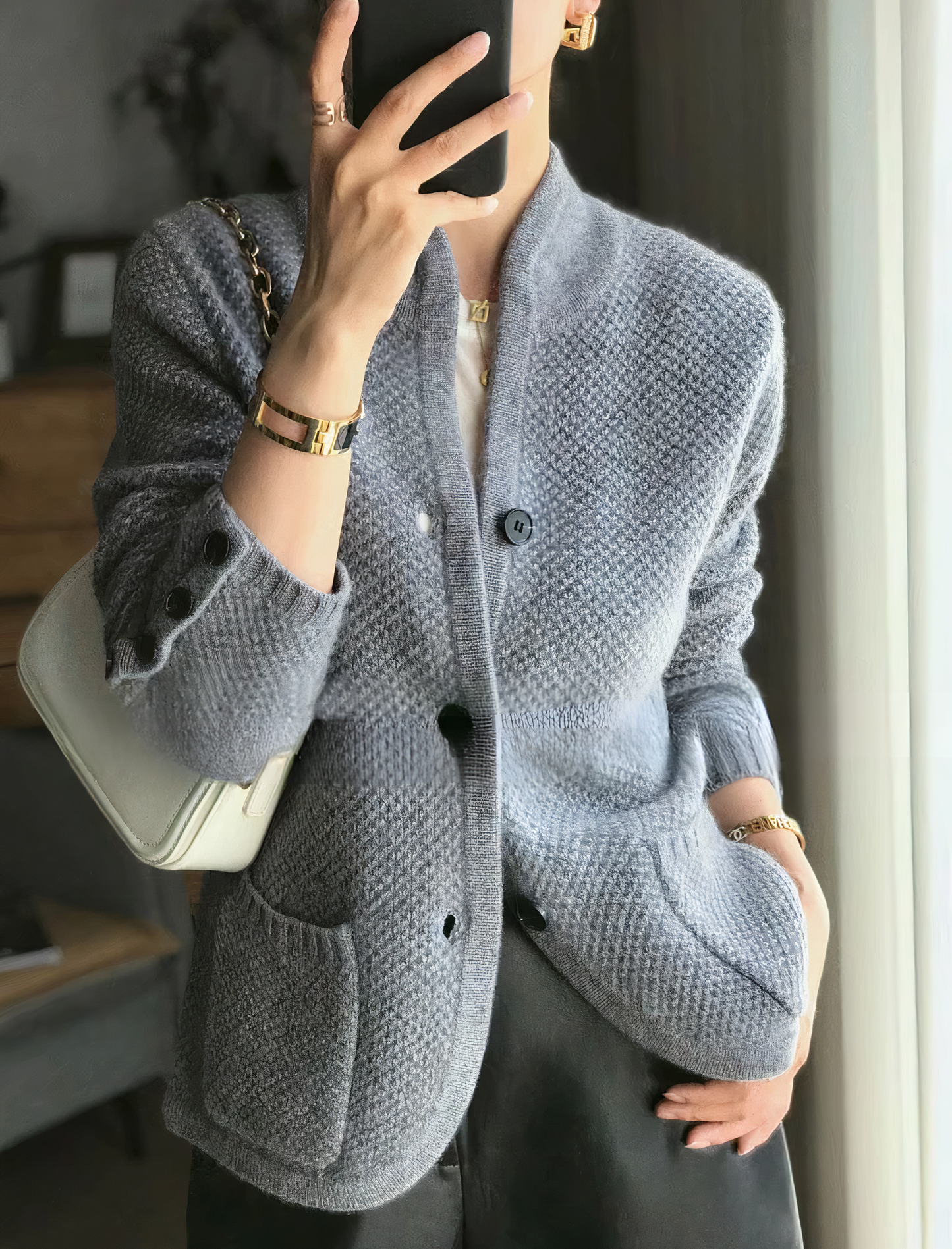 Women's slim-fit ivory cashmere cardigan with elegant button closure for timeless warmth